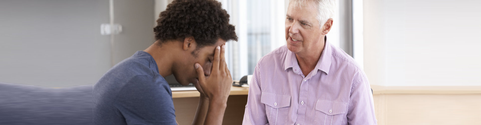 Young Man Having Counselling Session